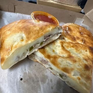 Medium Ribeye Steak with Onions & Peppers Stromboli